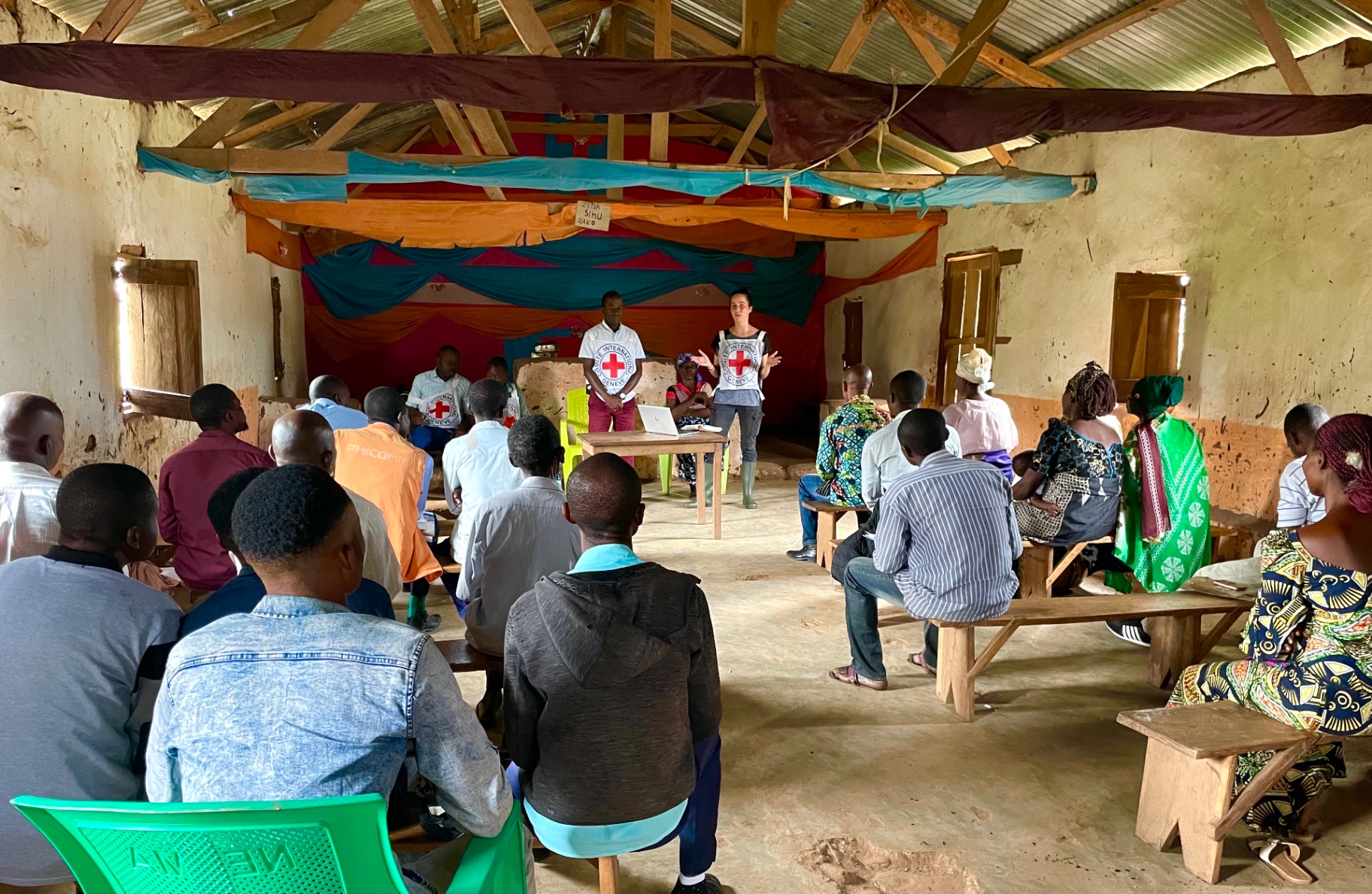 Taline training a community group in a rural hall