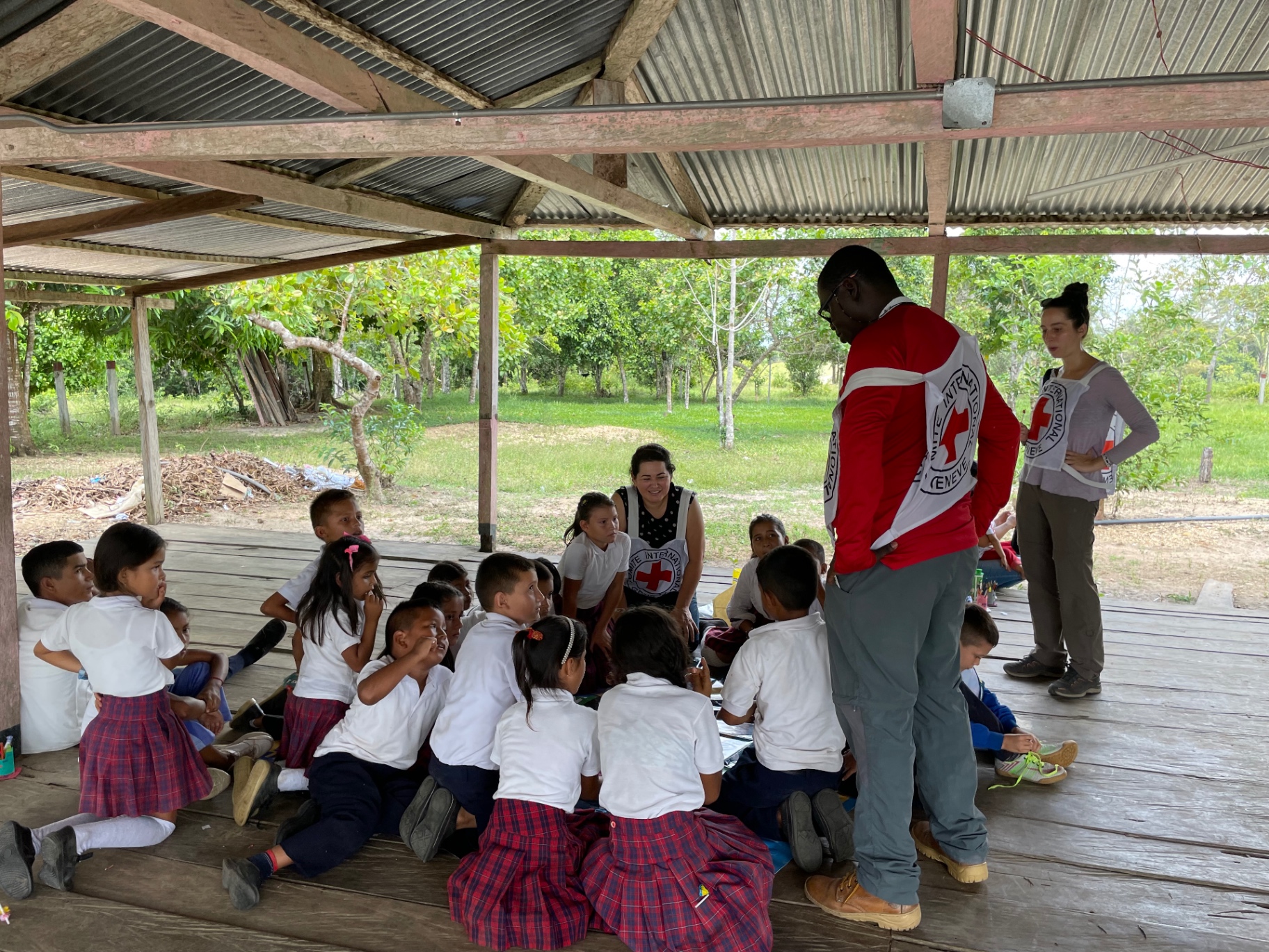 Taline with a group of children during a session in a rural community